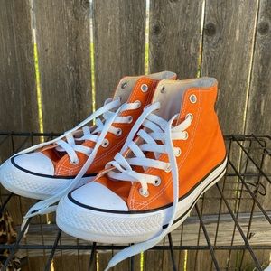 Orange high top converse
